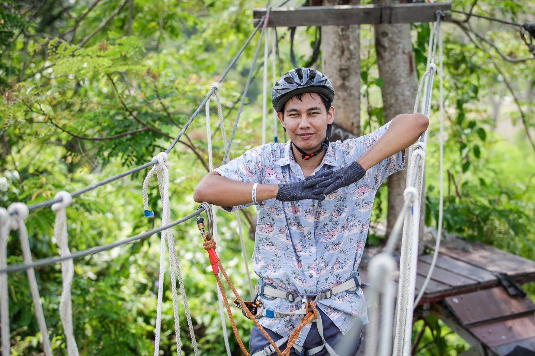 Friendly Tarzan Adventure guide on the rope course